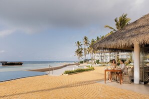 Breakfast, lunch, dinner served; local and international cuisine 