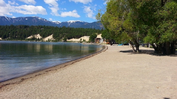On the beach, sun-loungers