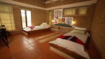 Desk, iron/ironing board, bed sheets