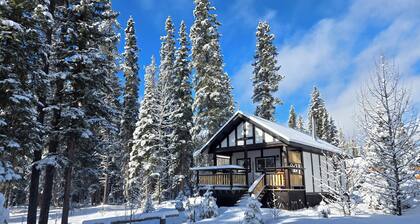 Cozy Fireside Cottage - White Goat