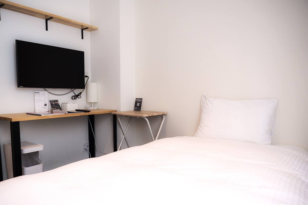 Single Room | Premium bedding, desk, blackout drapes, soundproofing