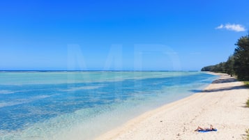 Una playa cerca, toallas de playa