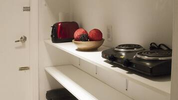 Fridge, microwave, toaster, cookware/dishes/utensils