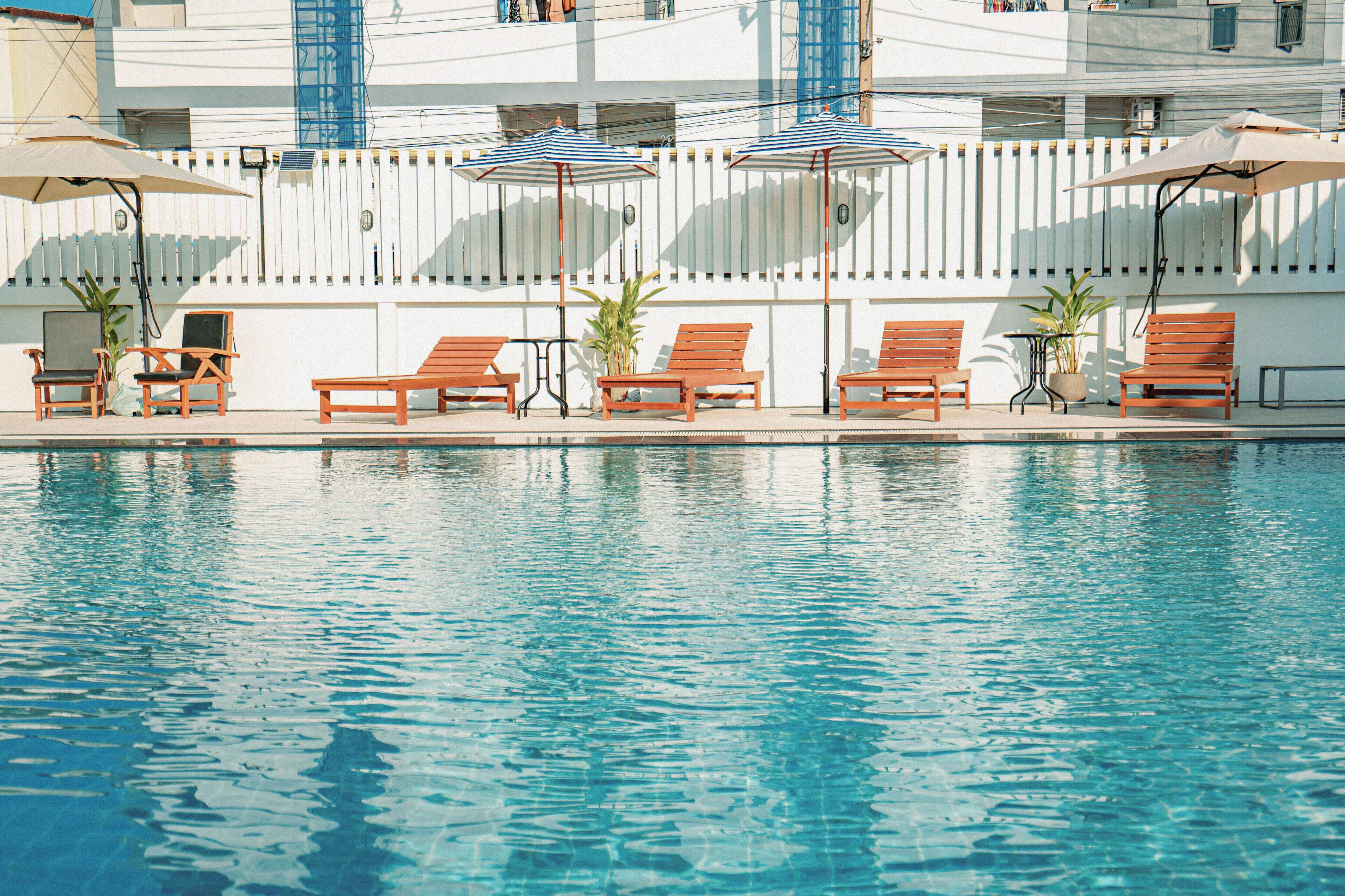 Outdoor pool, open 6:00 AM to 9:00 PM, pool umbrellas, sun loungers