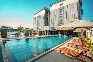 Outdoor pool, open 6:00 AM to 9:00 PM, pool umbrellas, sun loungers