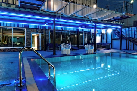 Outdoor pool, open 6:00 AM to 9:00 PM, pool umbrellas, sun loungers