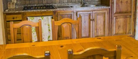 Apartment, 1 Bedroom (Acacia) | Private kitchenette | Shared fridge, electric kettle, highchair, cookware/dishes/utensils