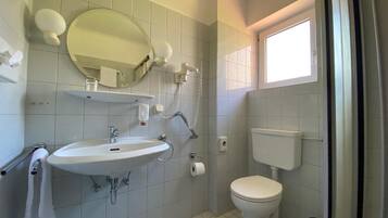 Shower, free toiletries, hair dryer, towels