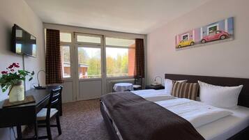 Desk, rollaway beds, free WiFi, bed sheets