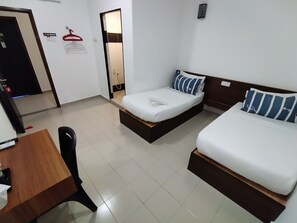 Standard Twin Room | Desk, iron/ironing board, free WiFi, bed sheets