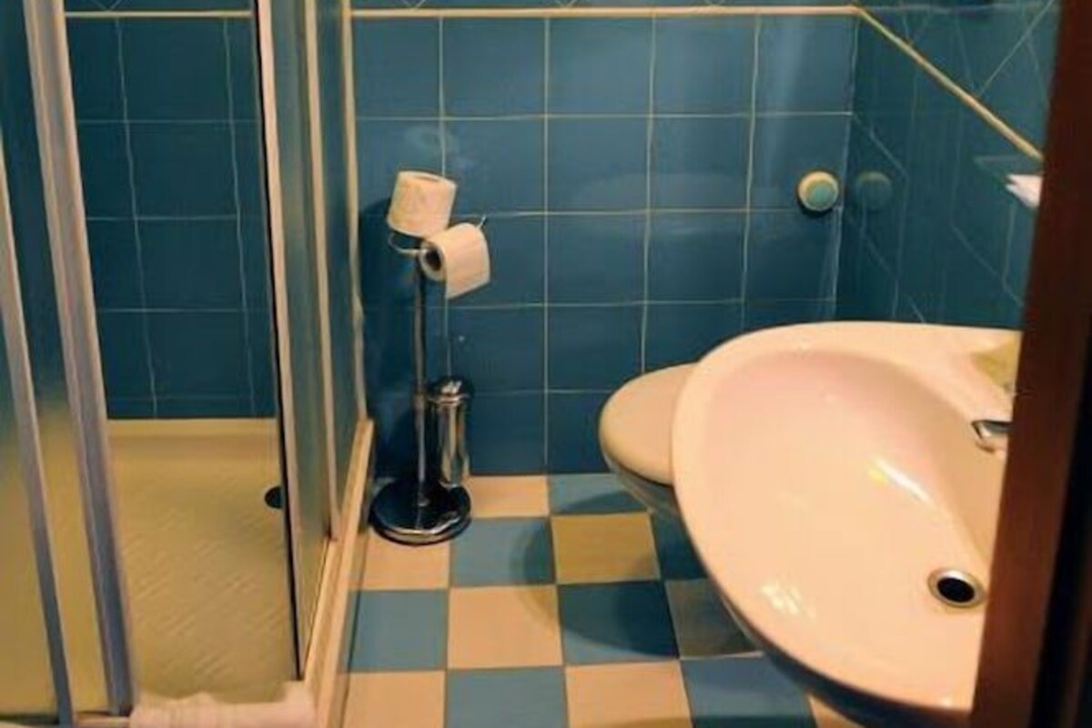 Bathroom | Shower, free toiletries, hair dryer, towels
