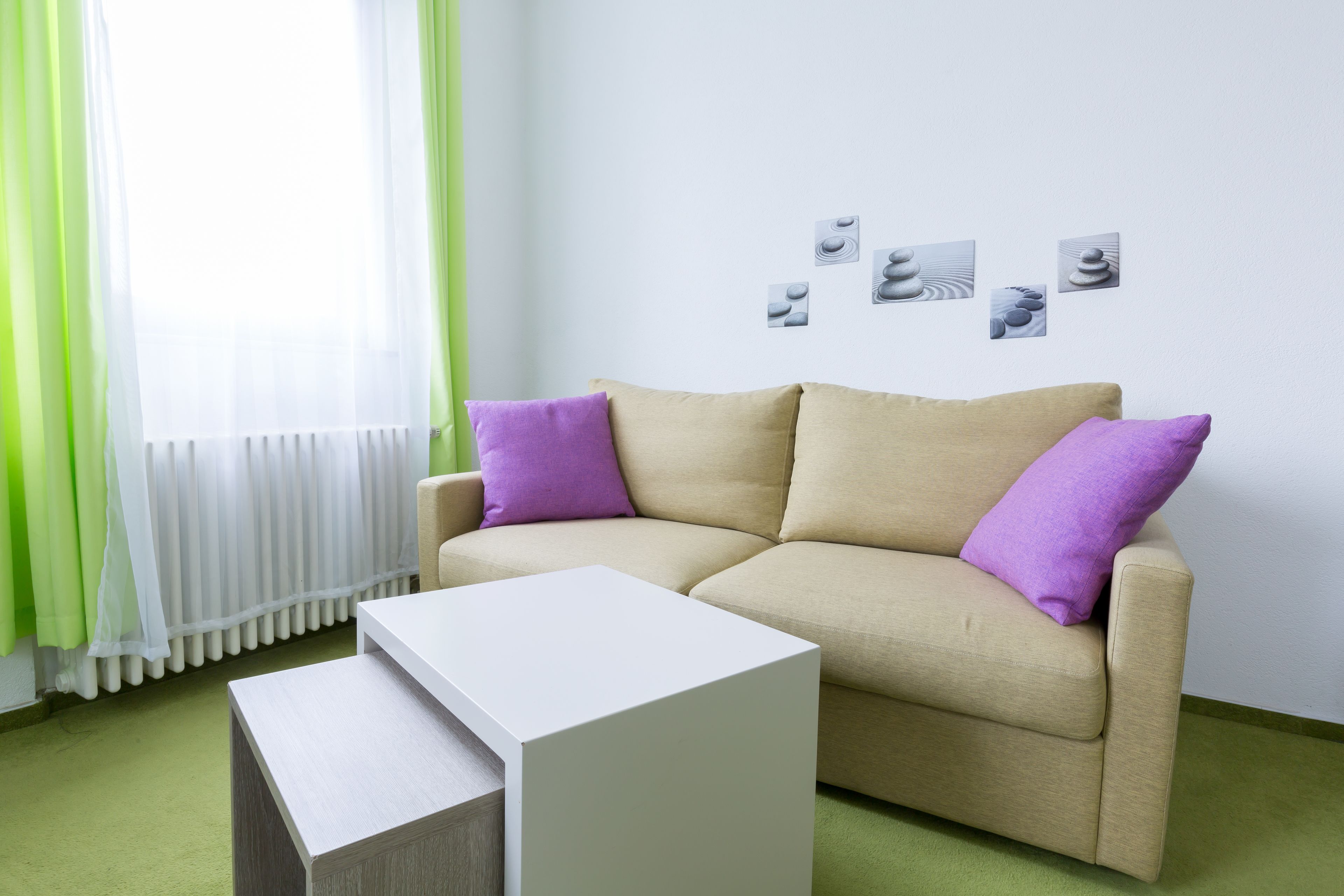 superior triple room | living area | flat-screen tv