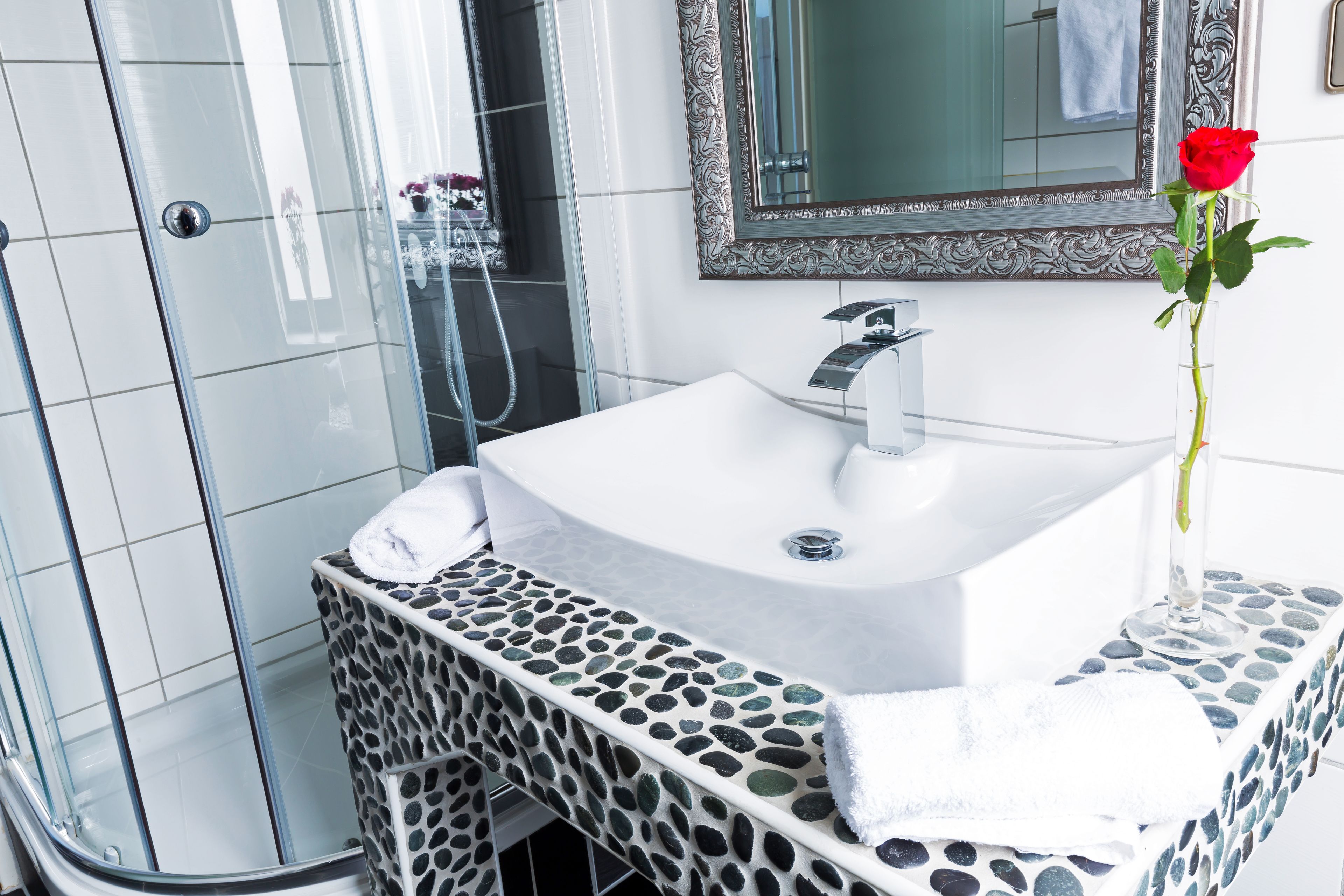 shower, free toiletries, hair dryer, towels