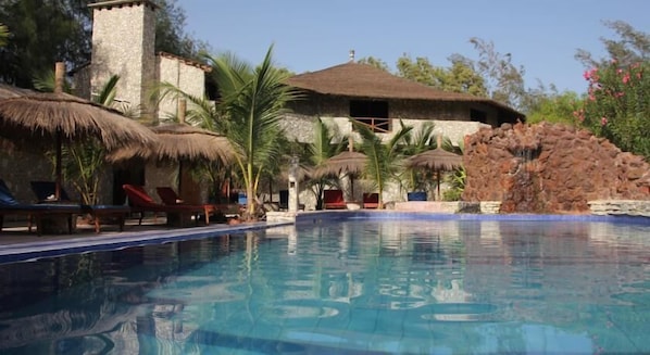 Outdoor pool, open 7 AM to 8 PM, pool umbrellas, sun loungers