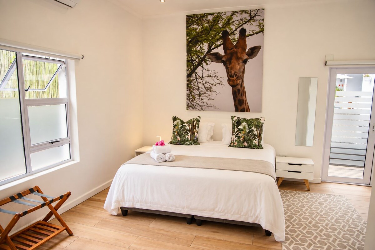 Ropa de cama de alta calidad y tabla de planchar con plancha