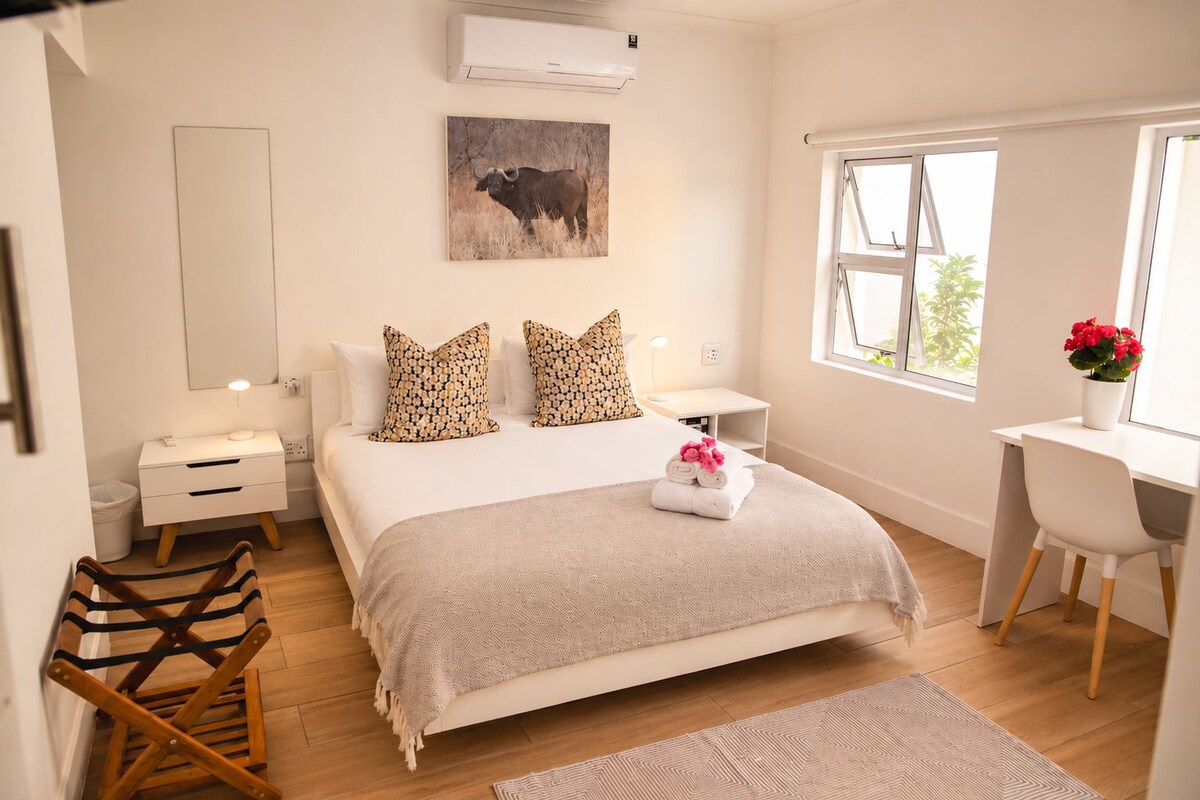 Ropa de cama de alta calidad y tabla de planchar con plancha
