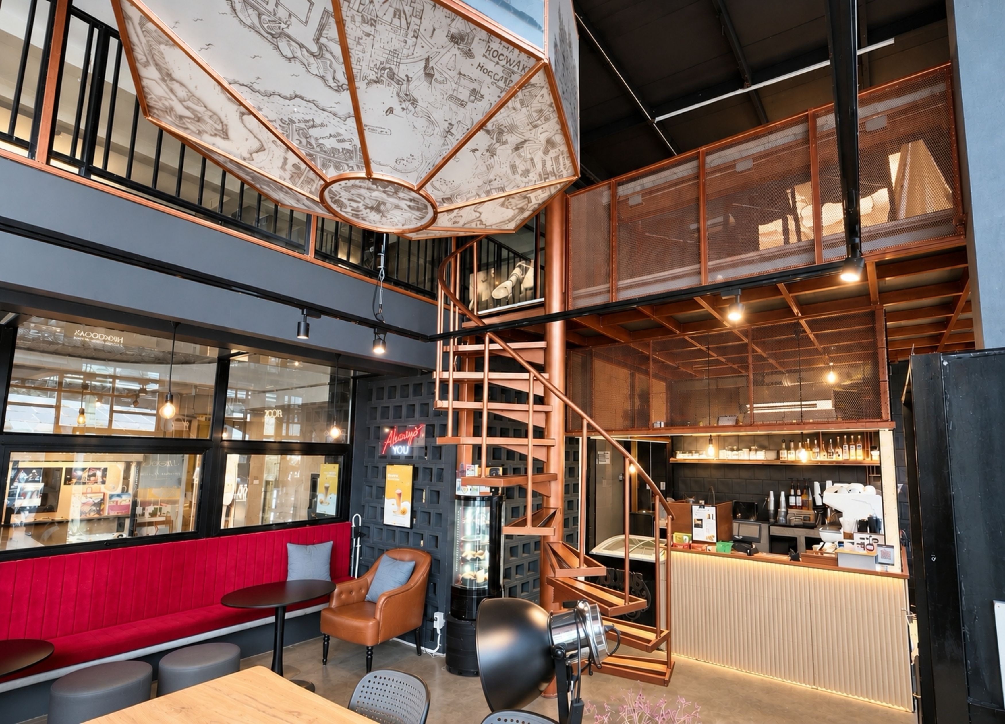A modern interior with a staircase, seating area, and a bar.