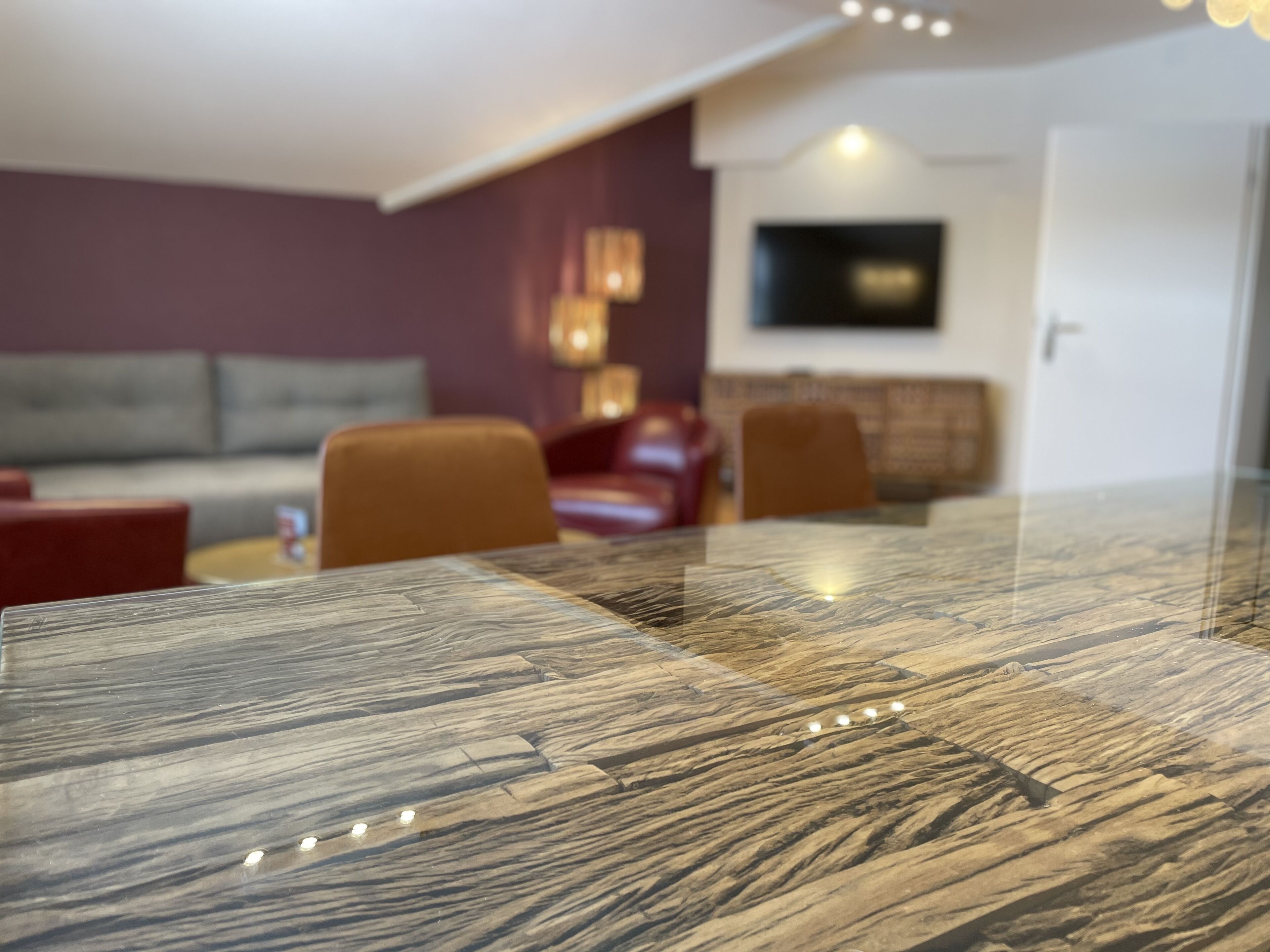 traditional apartment, balcony, mountain view | living area | flat-screen tv