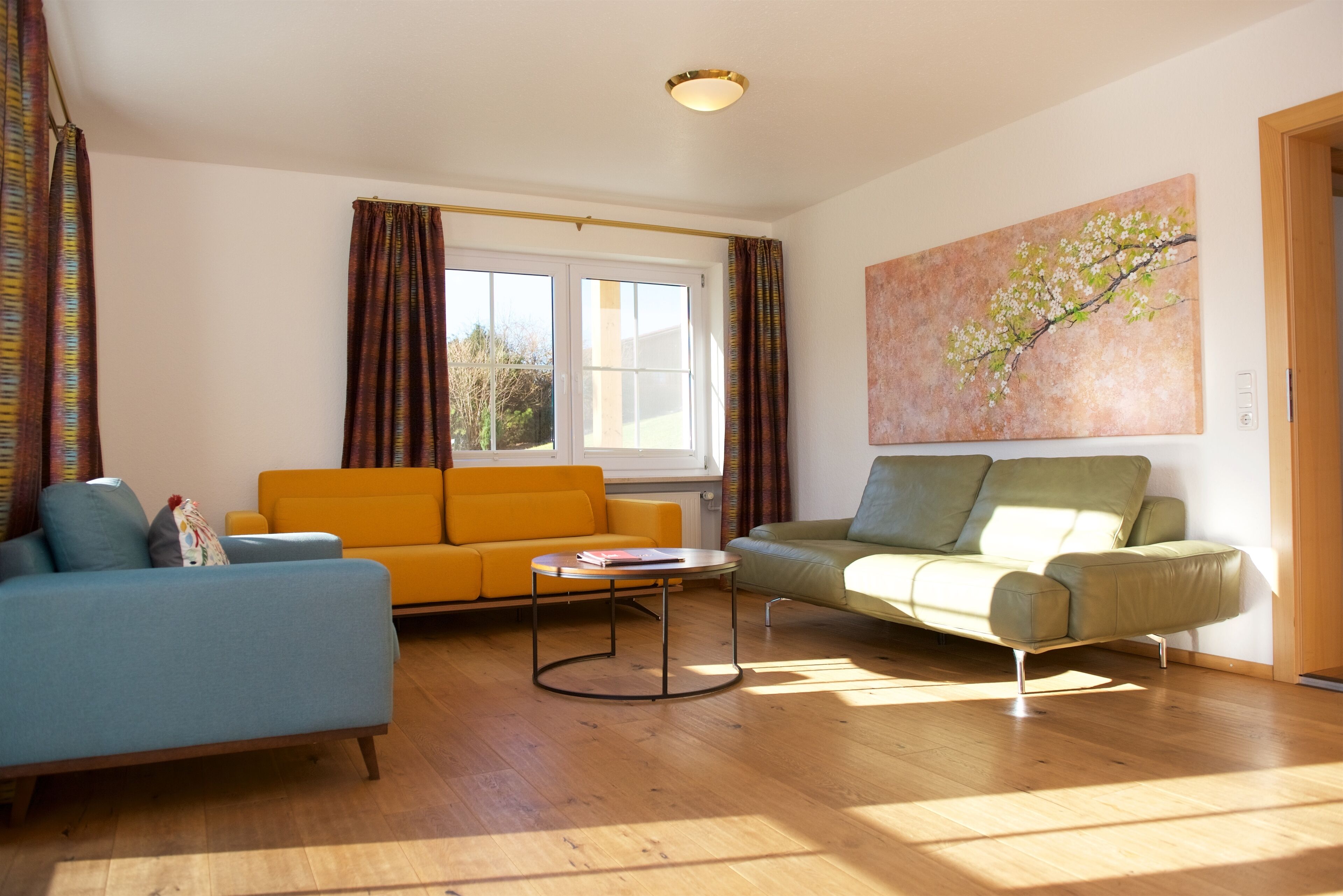 traditional apartment, balcony, mountain view | living room | flat-screen tv