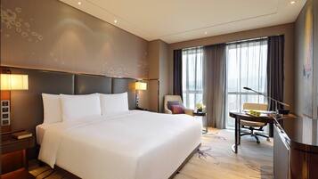 Premium bedding, down duvets, memory-foam beds, minibar