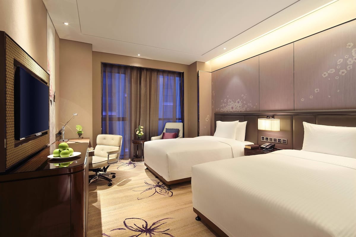 ห้องเอ็กเซกคิวทีฟทวิน | เครื่องนอนระดับพรีเมียม, ผ้านวมขนเป็ด, เตียงเมมโมรีโฟม, มินิบาร์