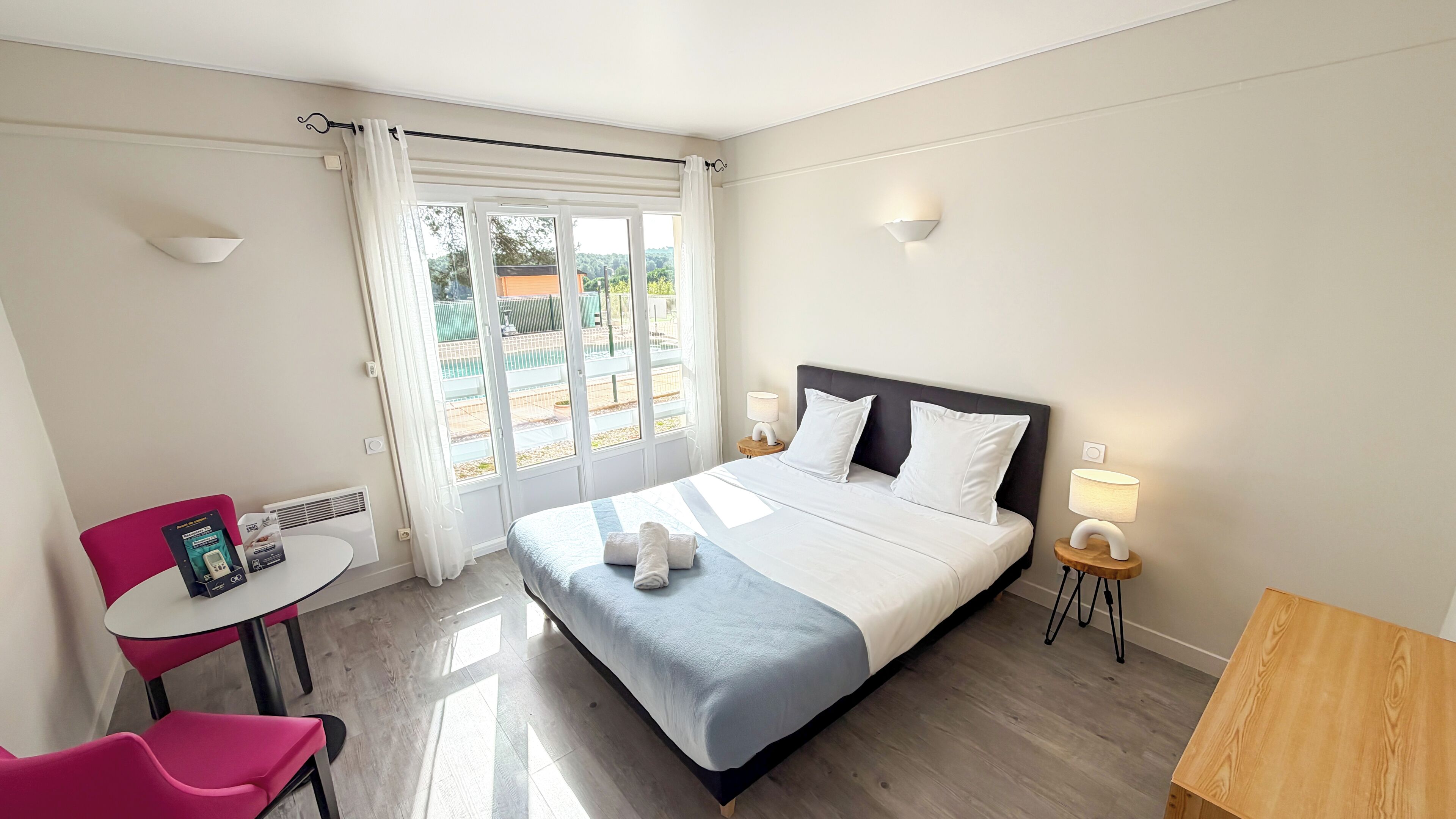 Individually furnished, desk, laptop workspace, iron/ironing board