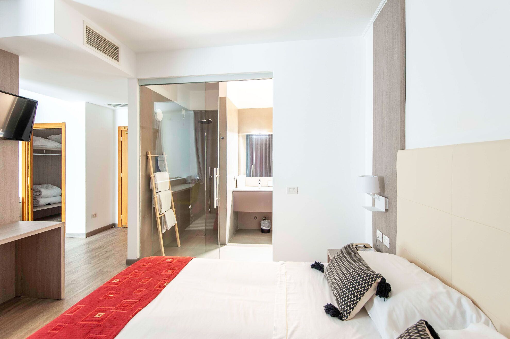 deluxe quadruple room | premium bedding, in-room safe, free wifi, bed sheets