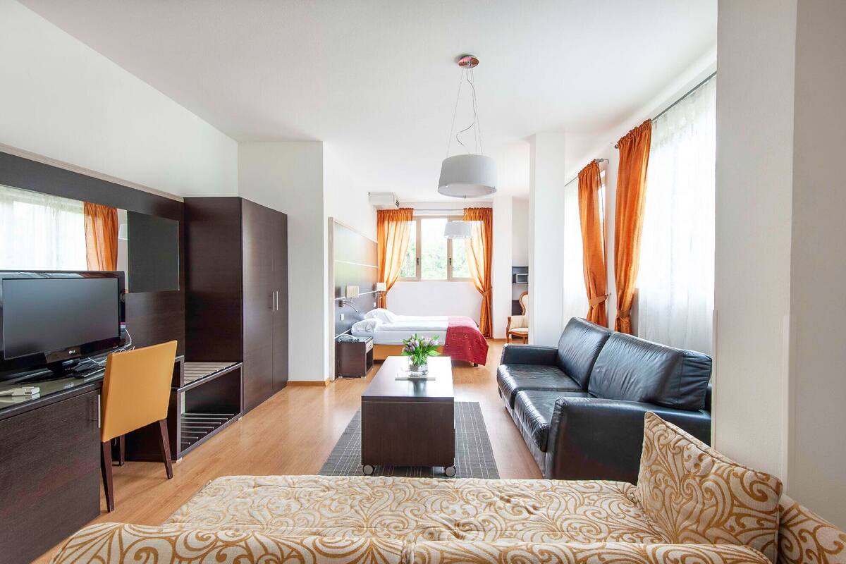 deluxe quadruple room | premium bedding, in-room safe, free wifi, bed sheets