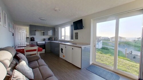 With views towards St. Ives bay and spacious accommodation for up to six guests