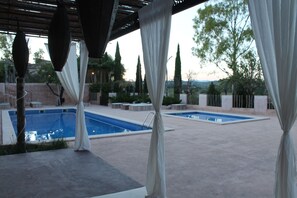 2 outdoor pools, pool umbrellas, pool loungers