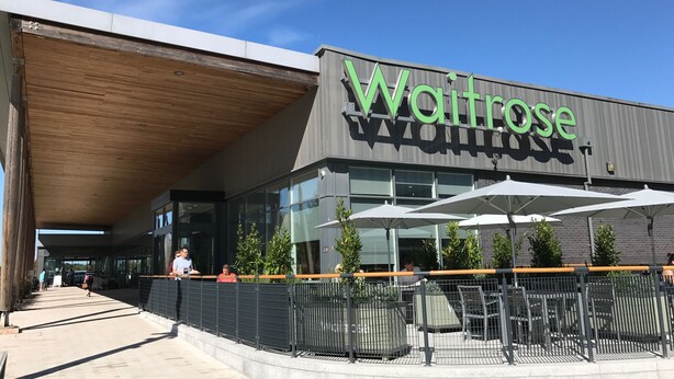A Waitrose store with a modern facade, large windows, and outdoor seating area with umbrellas. - Lovely 1 bedroom, with parking & patio, 5 min walk from Lexicon  & Train Station (Bracknell)