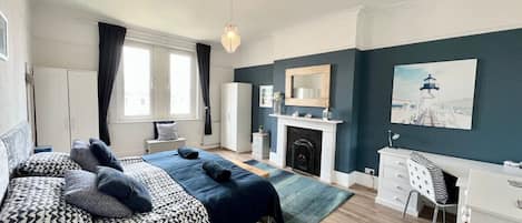 2 bedrooms, desk, iron/ironing board, travel crib