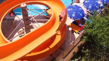 Outdoor pool, open 10:00 AM to 6:00 PM, pool umbrellas, pool loungers