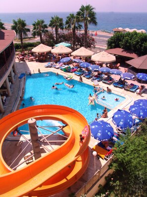 Outdoor pool, open 10:00 AM to 6:00 PM, pool umbrellas, pool loungers