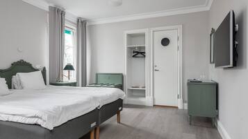 Dubbelrum | MörklÀggningsgardiner och sÀngklÀder