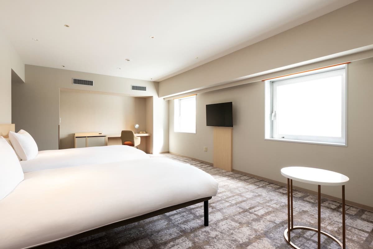 Habitación Deluxe, 2 camas individuales (Premium) | Escritorio, tabla de planchar con plancha, wifi gratis y ropa de cama