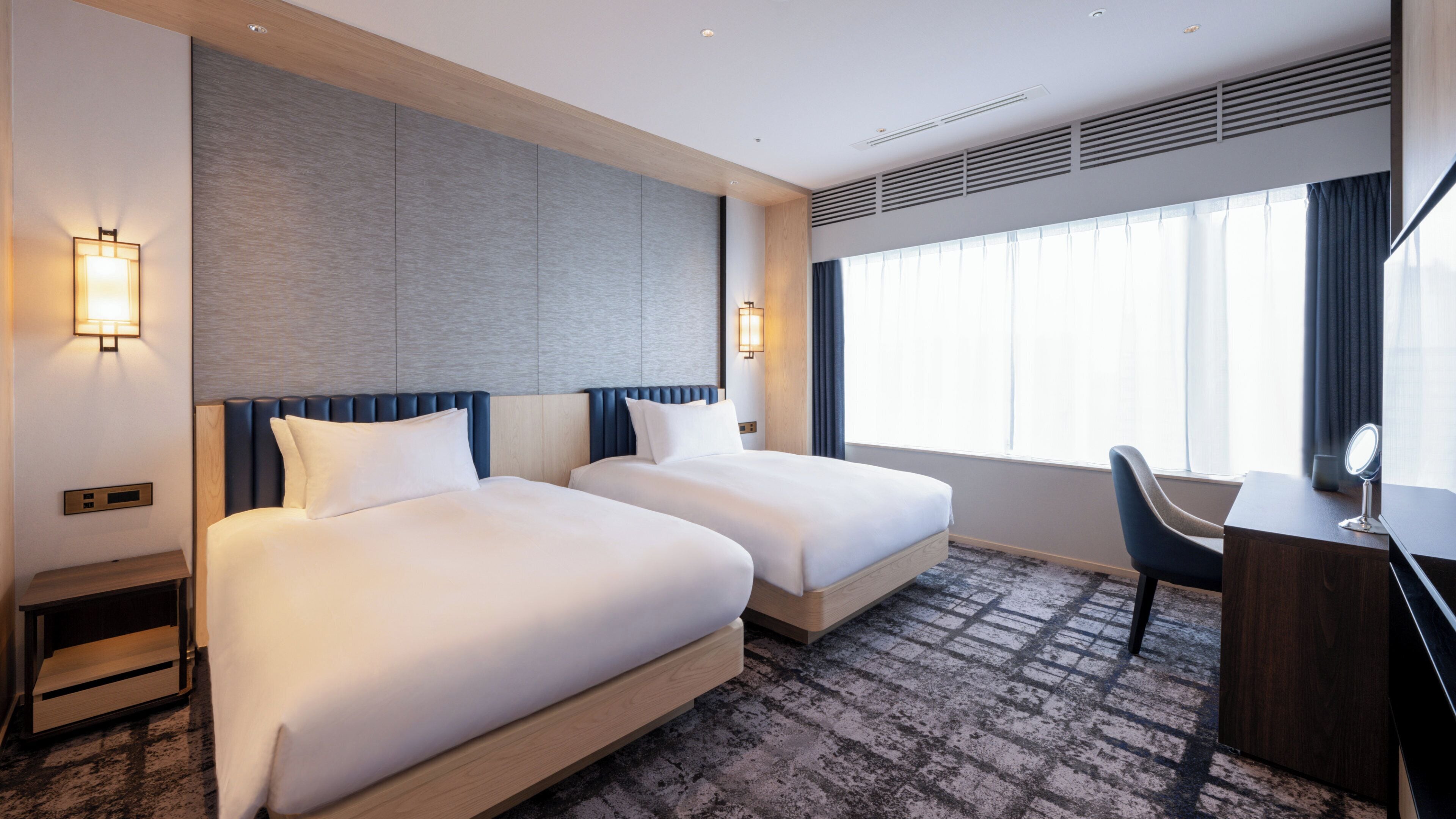 Suite, 2 eenpersoonsbedden, toegang tot de clublounge | Een bureau, een strijkplank/strijkijzer, gratis wifi, beddengoed