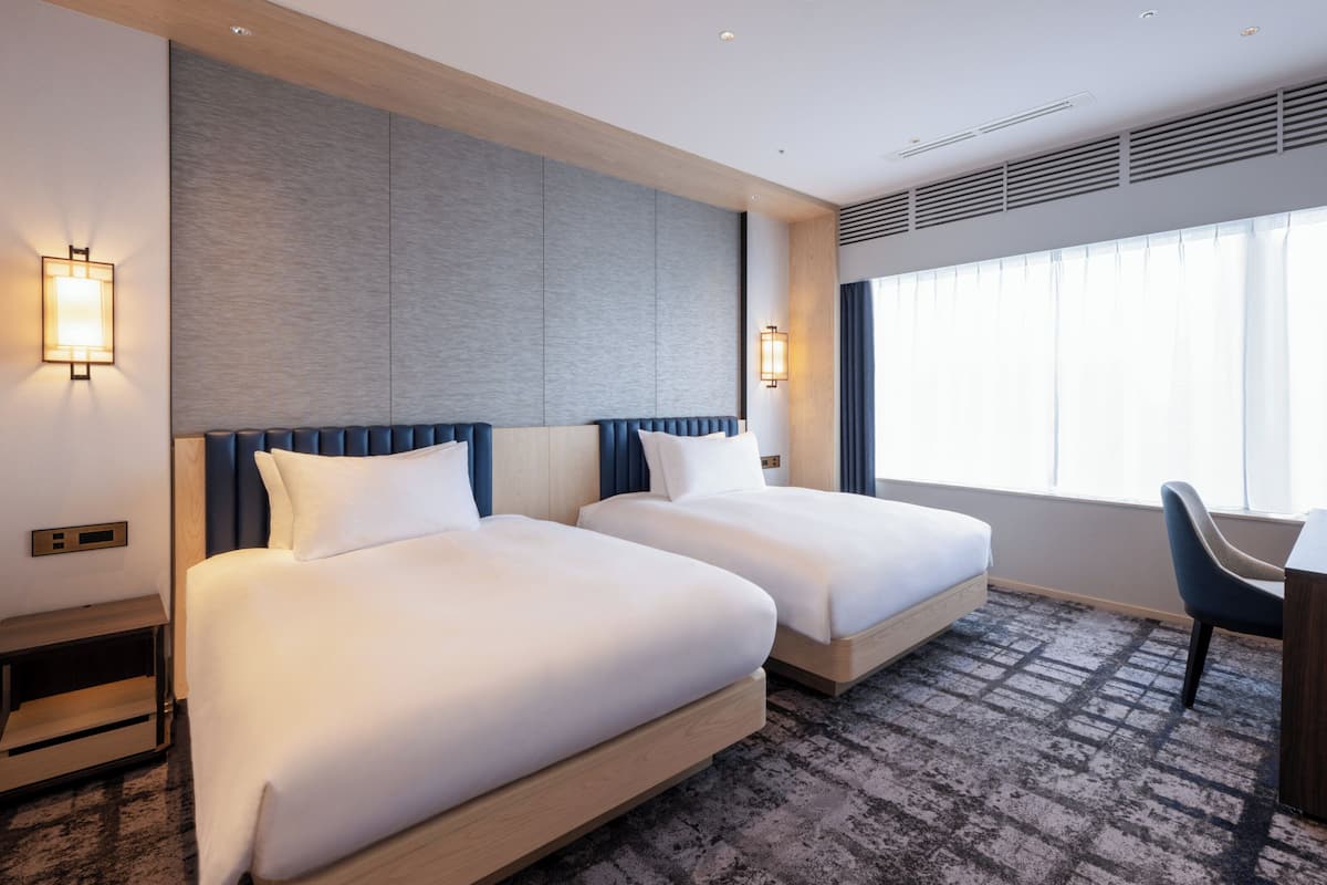 Suite, 2 enkeltsenger, Club Lounge-tilgang | Skrivebord, strykejern/-brett, wi-fi (inkludert) og sengetøy