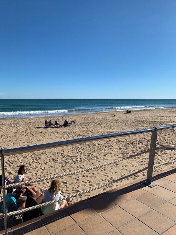 On the beach, beach towels