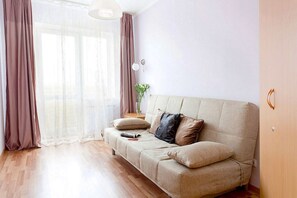 Apartment on Mashinistov, 3-10 | Living room | Flat-screen TV - Apartment Etazhydaily Mashinistov (Yekaterinburg)