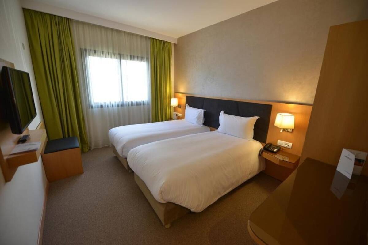 Premium bedding, desk, blackout curtains, soundproofing