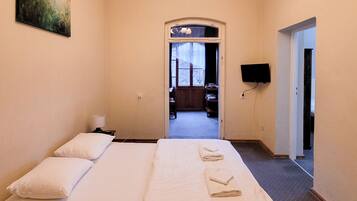 Familienstudio, 2 Schlafzimmer, Nichtraucher, Veranda | Allergikerbettwaren, individuell dekoriert, kostenloses WLAN, Bettwäsche