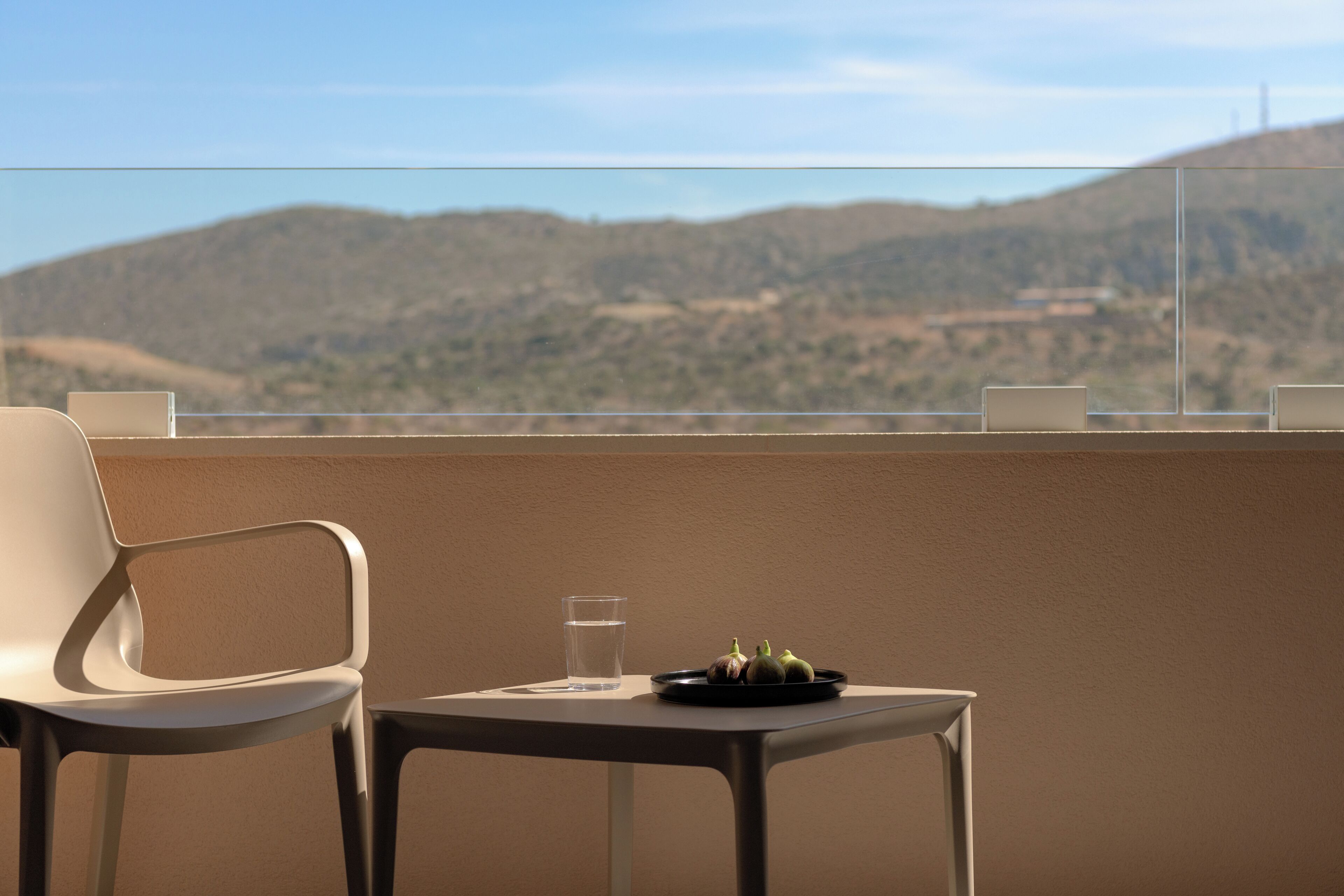 Junior Suite with Golf Course and Mountain View | Balcony view