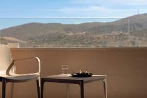Junior Suite with Golf Course and Mountain View | Balcony view