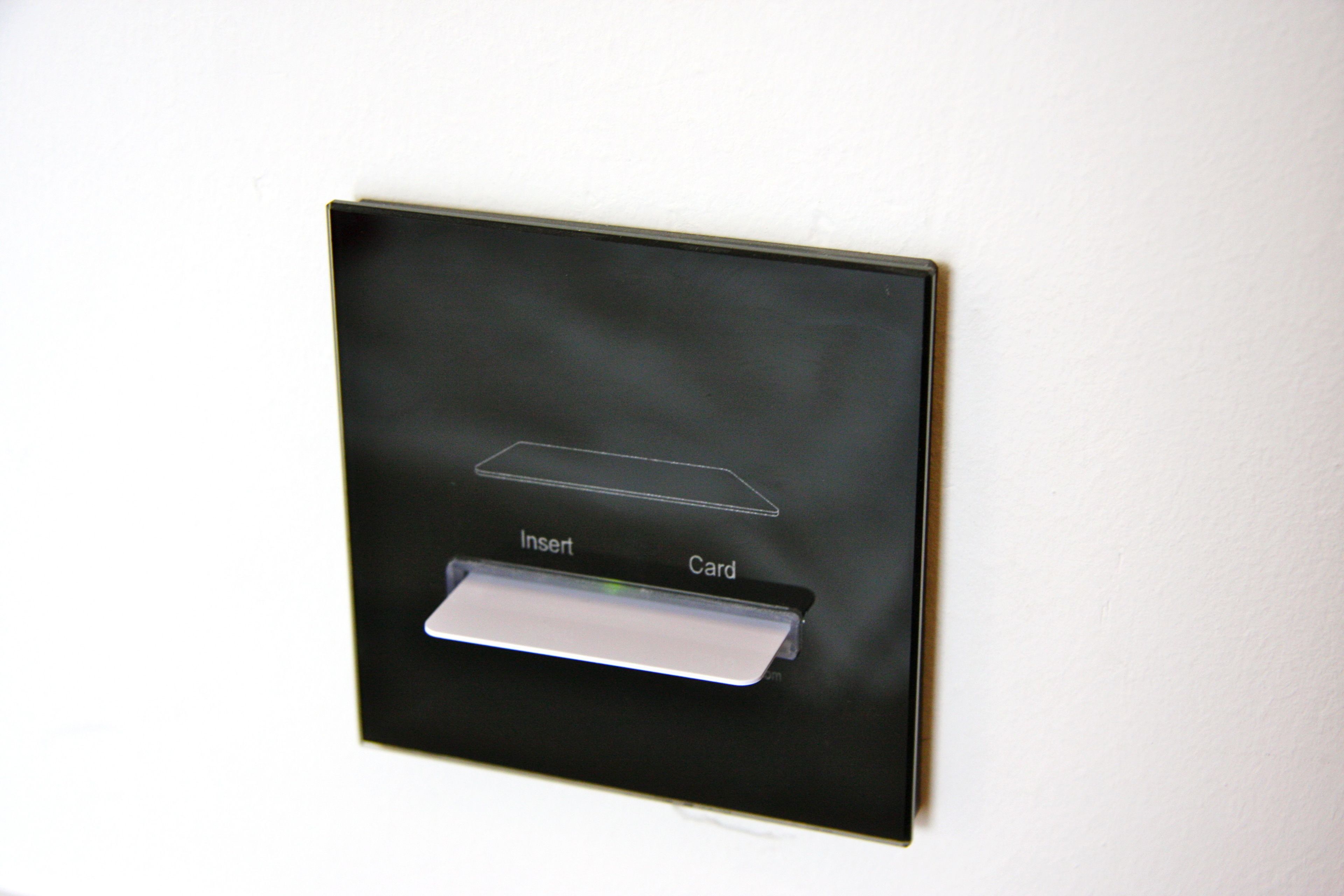 A card reader on a wall.