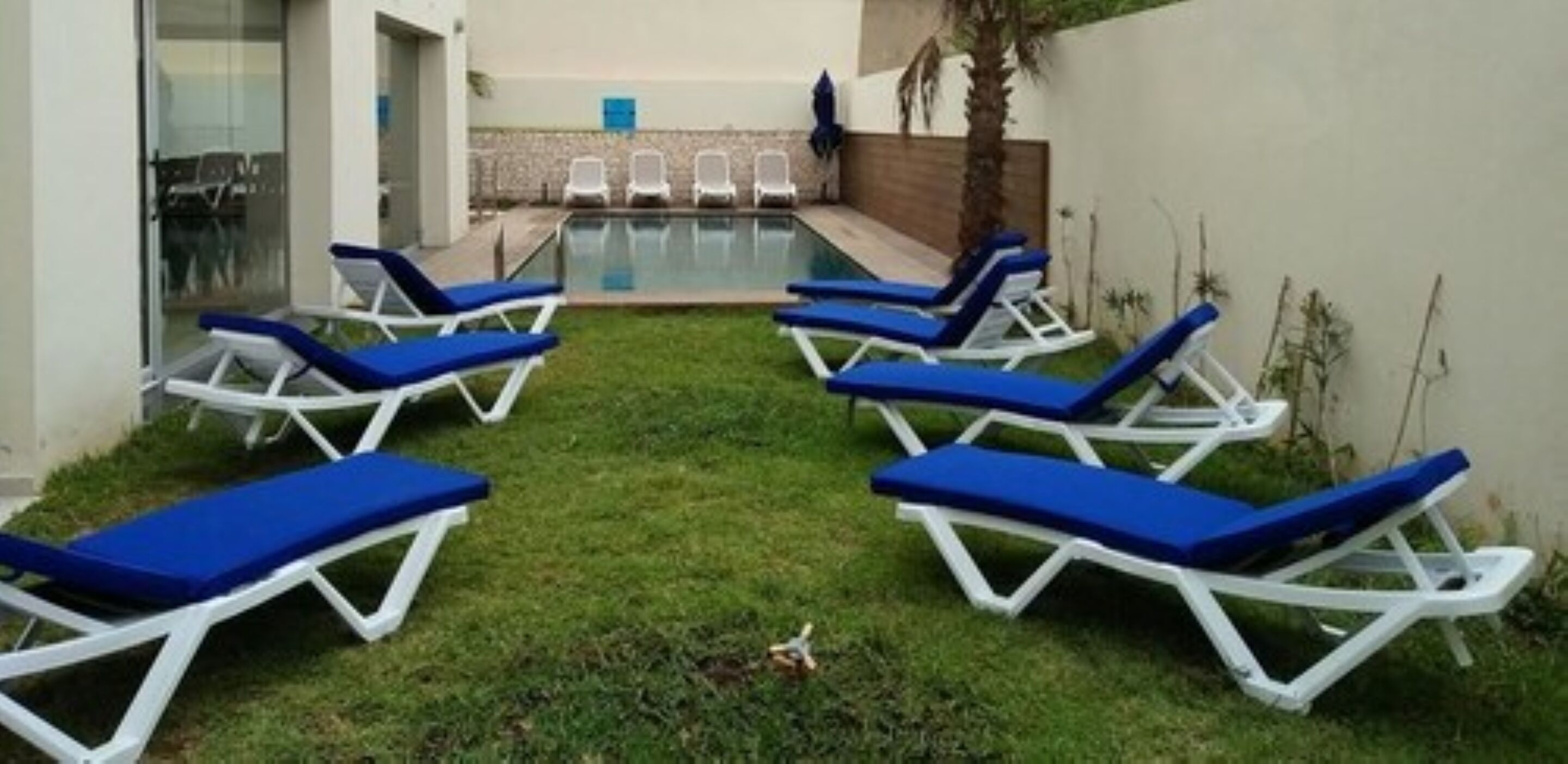 outdoor pool, pool loungers
