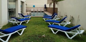 Outdoor pool, pool loungers