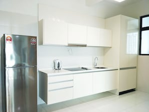 Luxury Apartment, 3 Bedrooms, City View | Private kitchen | Full-sized fridge, stovetop, high chair, cookware/dishes/utensils