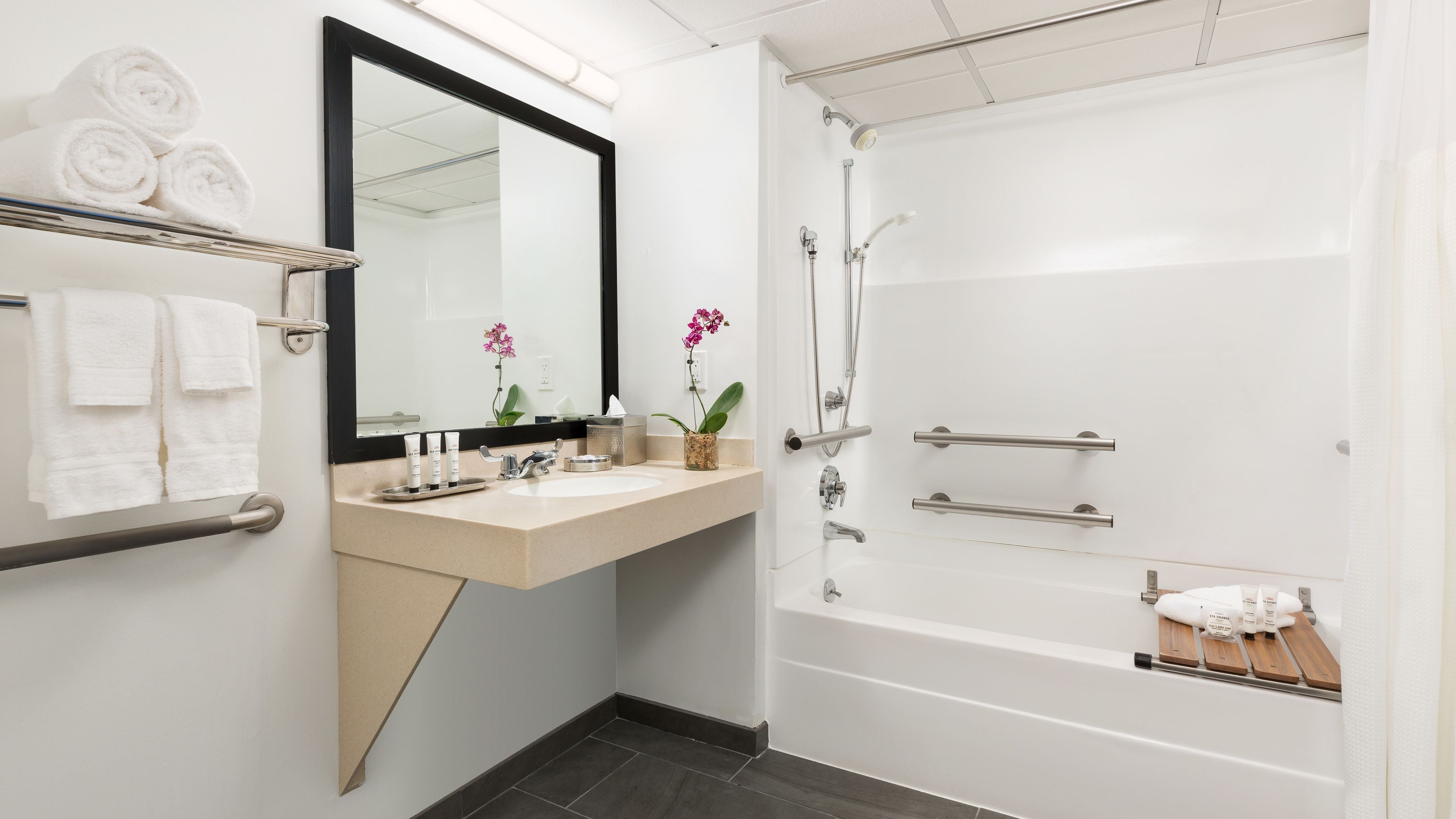 combined shower/bathtub, free toiletries, hair dryer, slippers