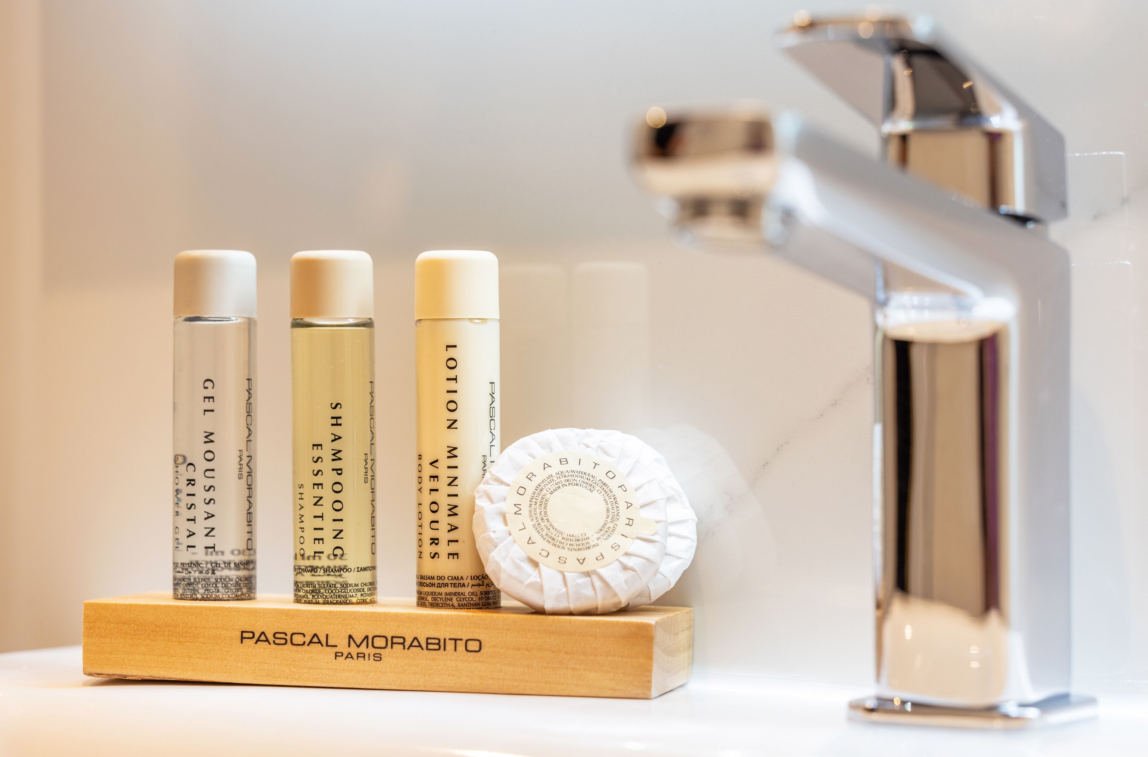 designer toiletries, hair dryer, bathrobes, slippers